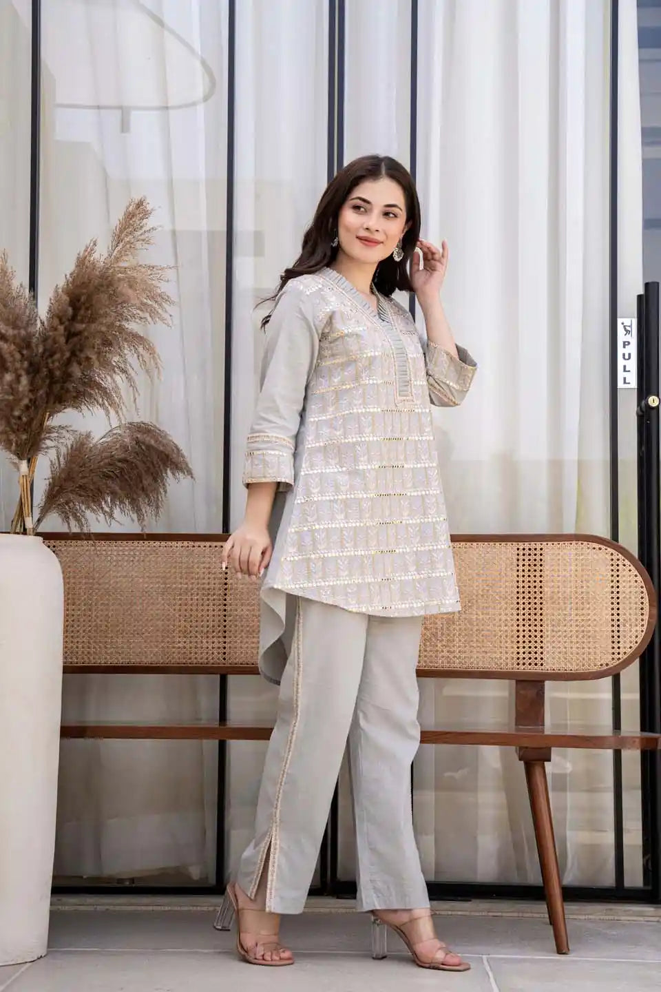 light gray embroidered v-neck kurta with straight pants set