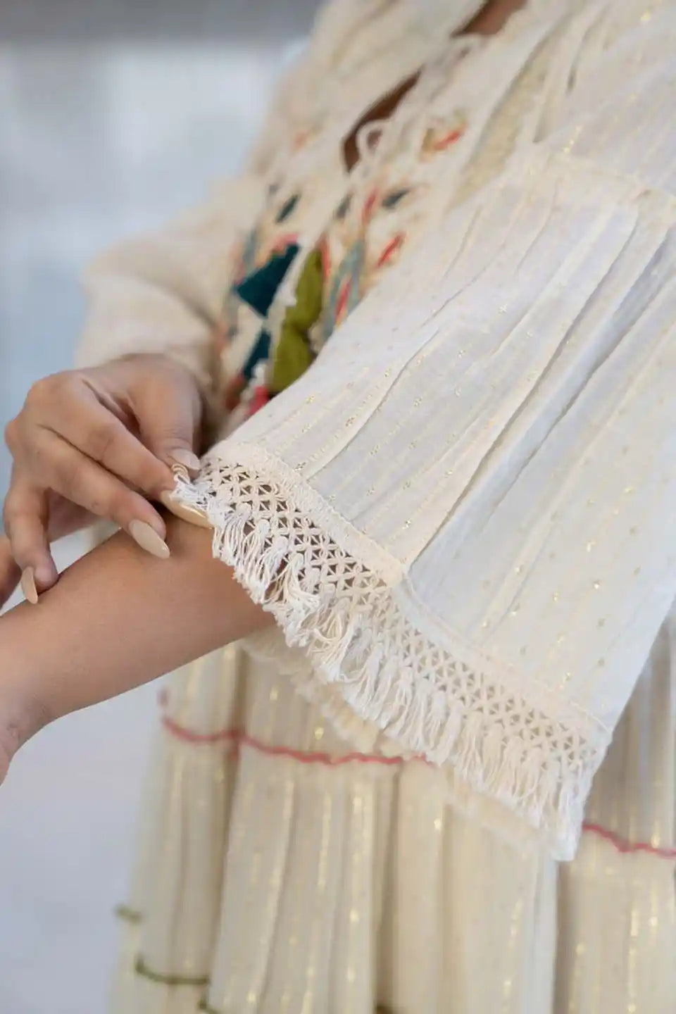 boho-chic off-white embroidered short dress with flared sleeves