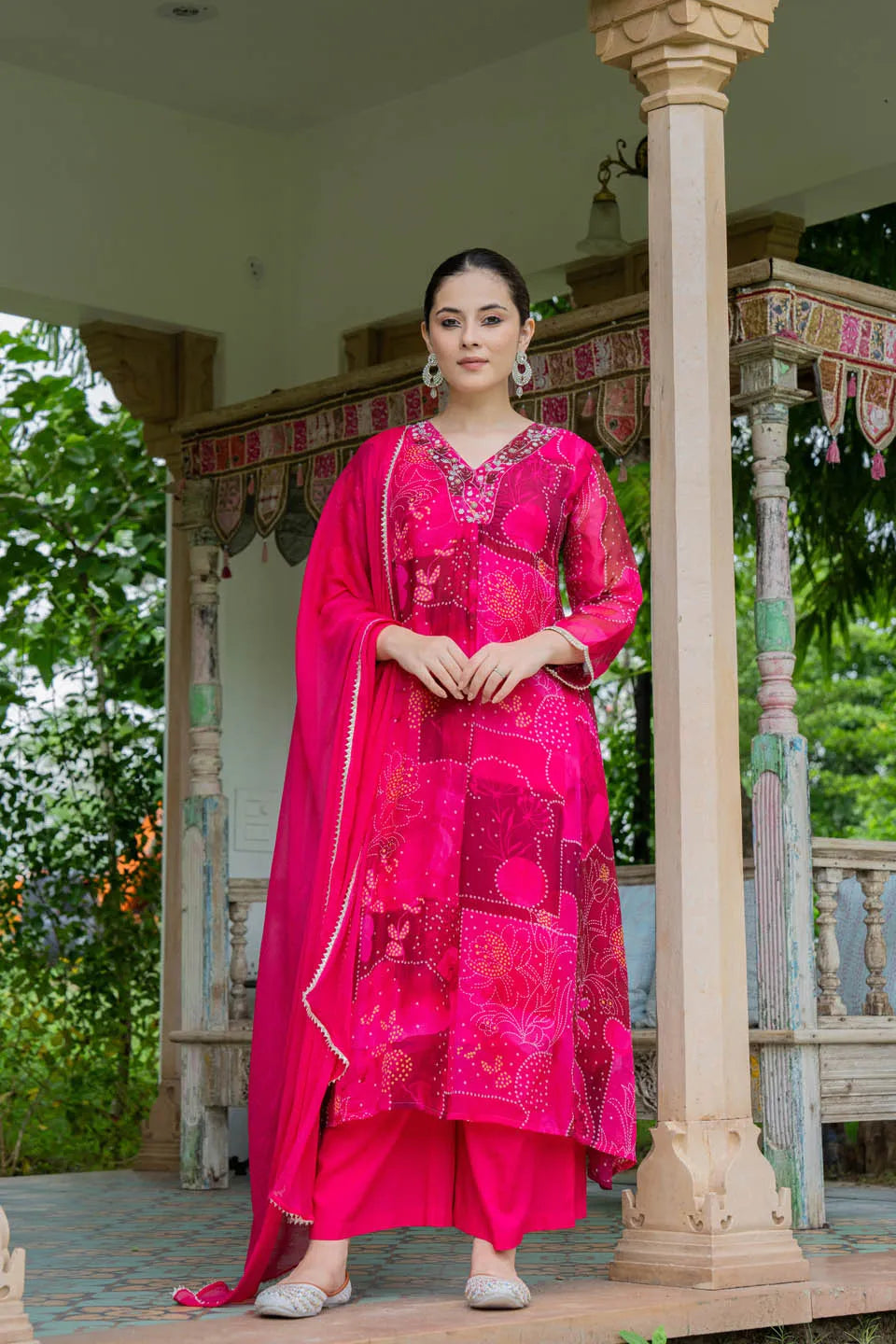 elegant red a line kurta set with embroidered v neck and abstract floral print