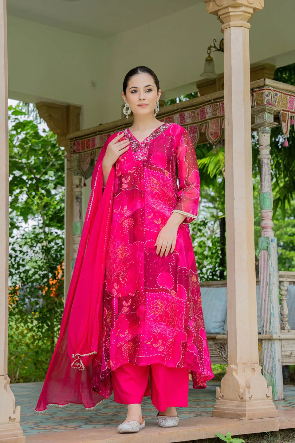 elegant red a line kurta set with embroidered v neck and abstract floral print