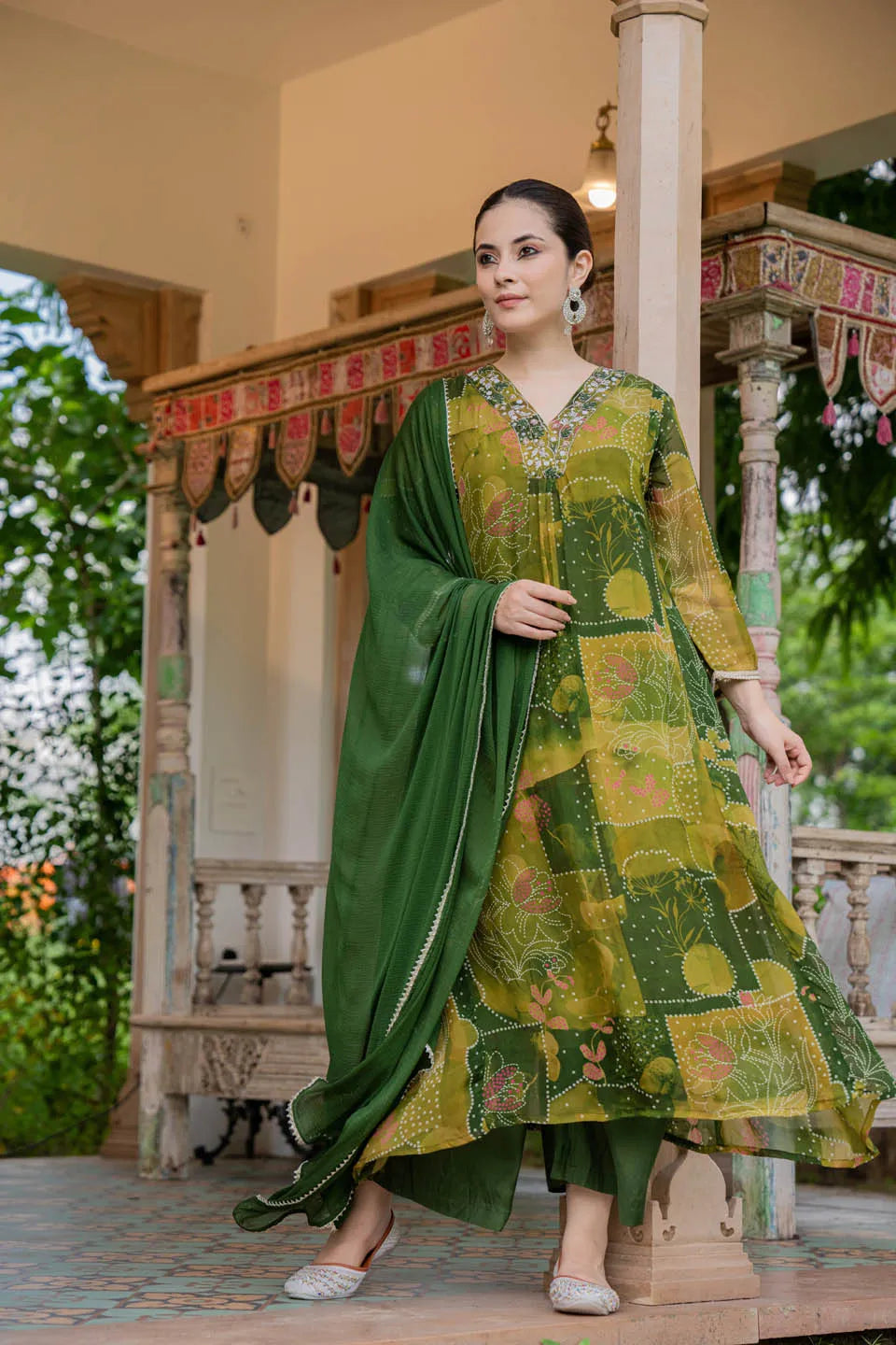 ELEGANT OLIVE GREEN A-LINE KURTA SET WITH EMBROIDERED V-NECK AND ABSTRACT FLORAL PRINT