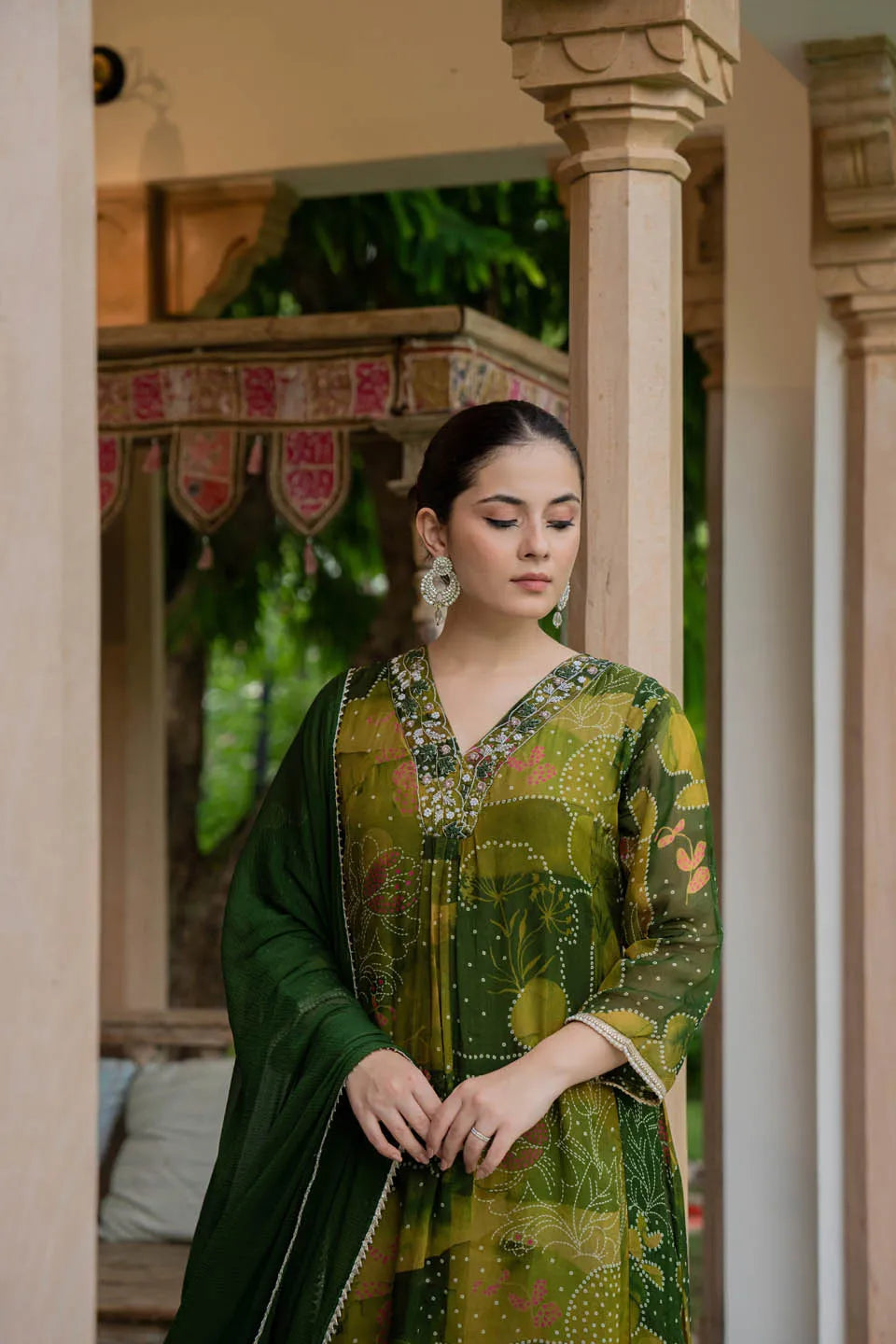 ELEGANT OLIVE GREEN A-LINE KURTA SET WITH EMBROIDERED V-NECK AND ABSTRACT FLORAL PRINT