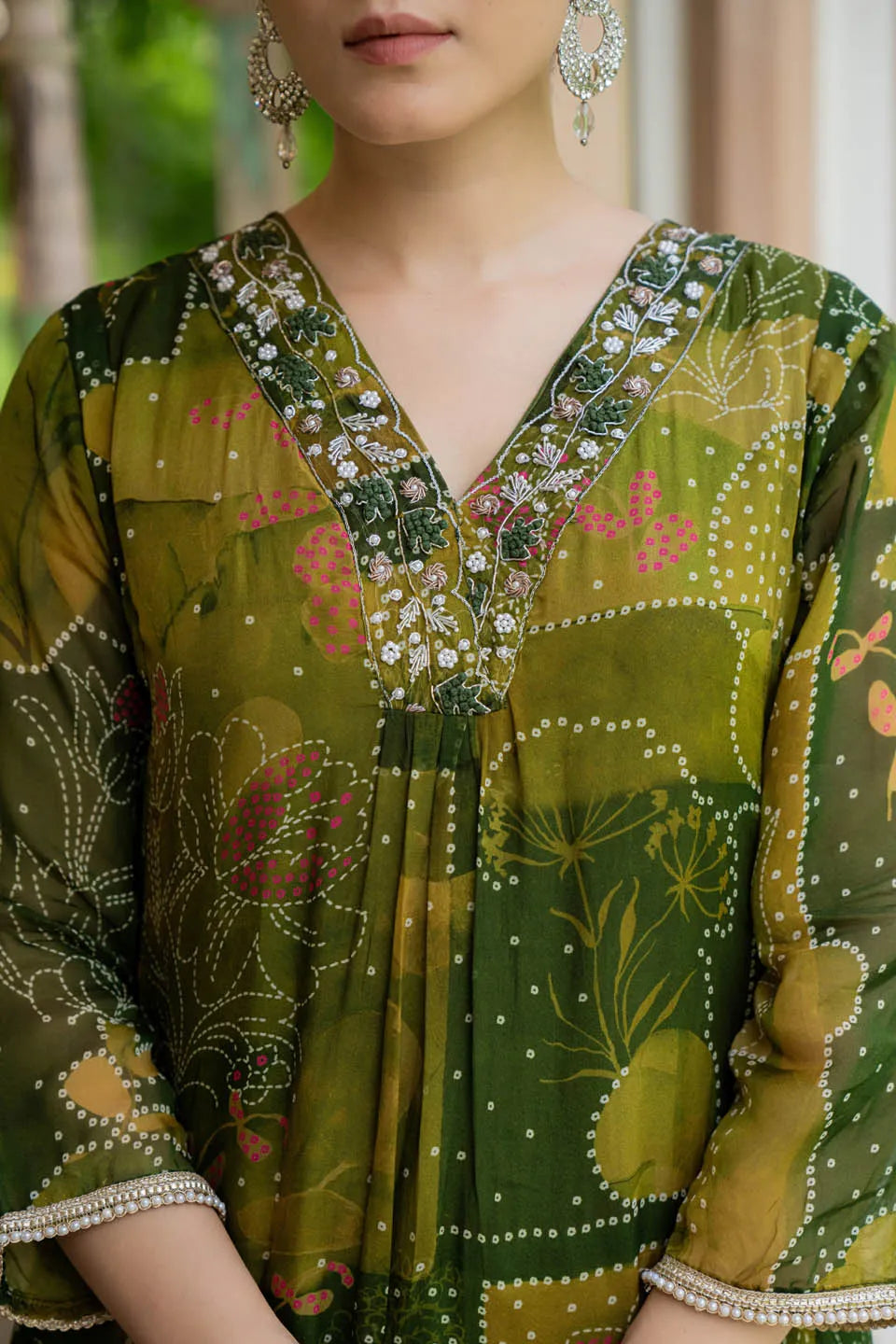 ELEGANT OLIVE GREEN A-LINE KURTA SET WITH EMBROIDERED V-NECK AND ABSTRACT FLORAL PRINT