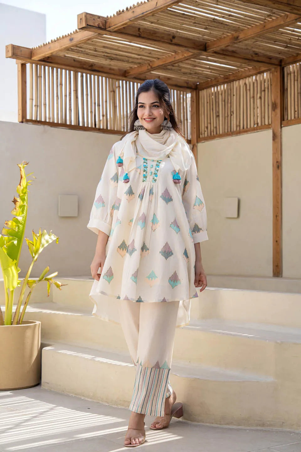 Pastel Geometric Printed A-Line Kurta Set with Embroidered Detailing & Dupatta