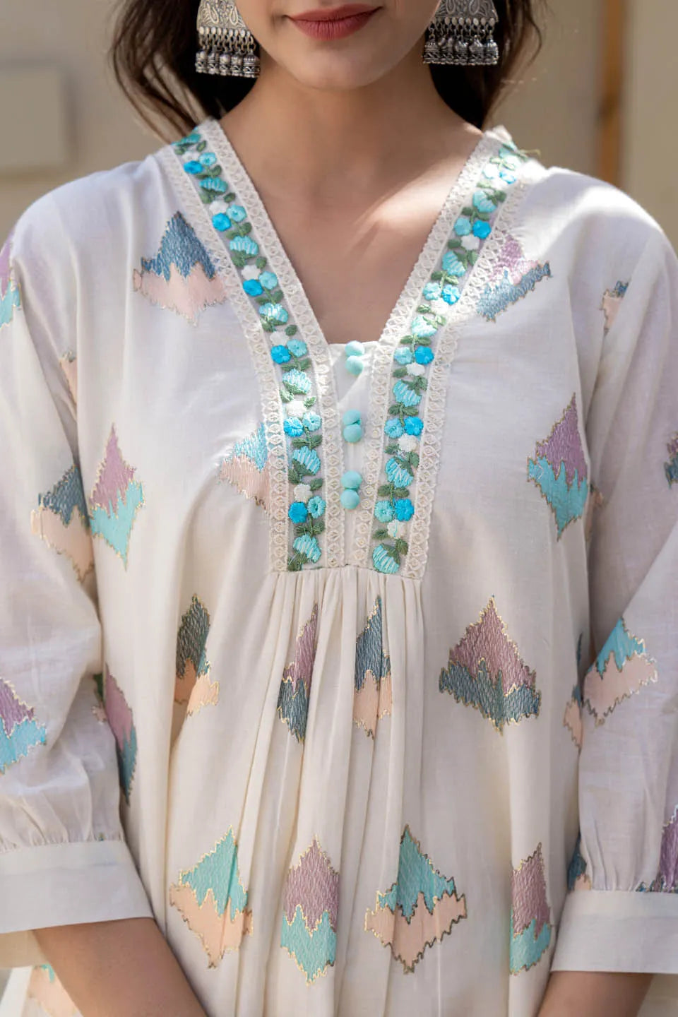 Pastel Geometric Printed A-Line Kurta Set with Embroidered Detailing & Dupatta